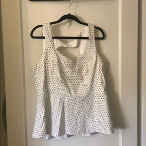 Polka dot peplum sleeveless top
